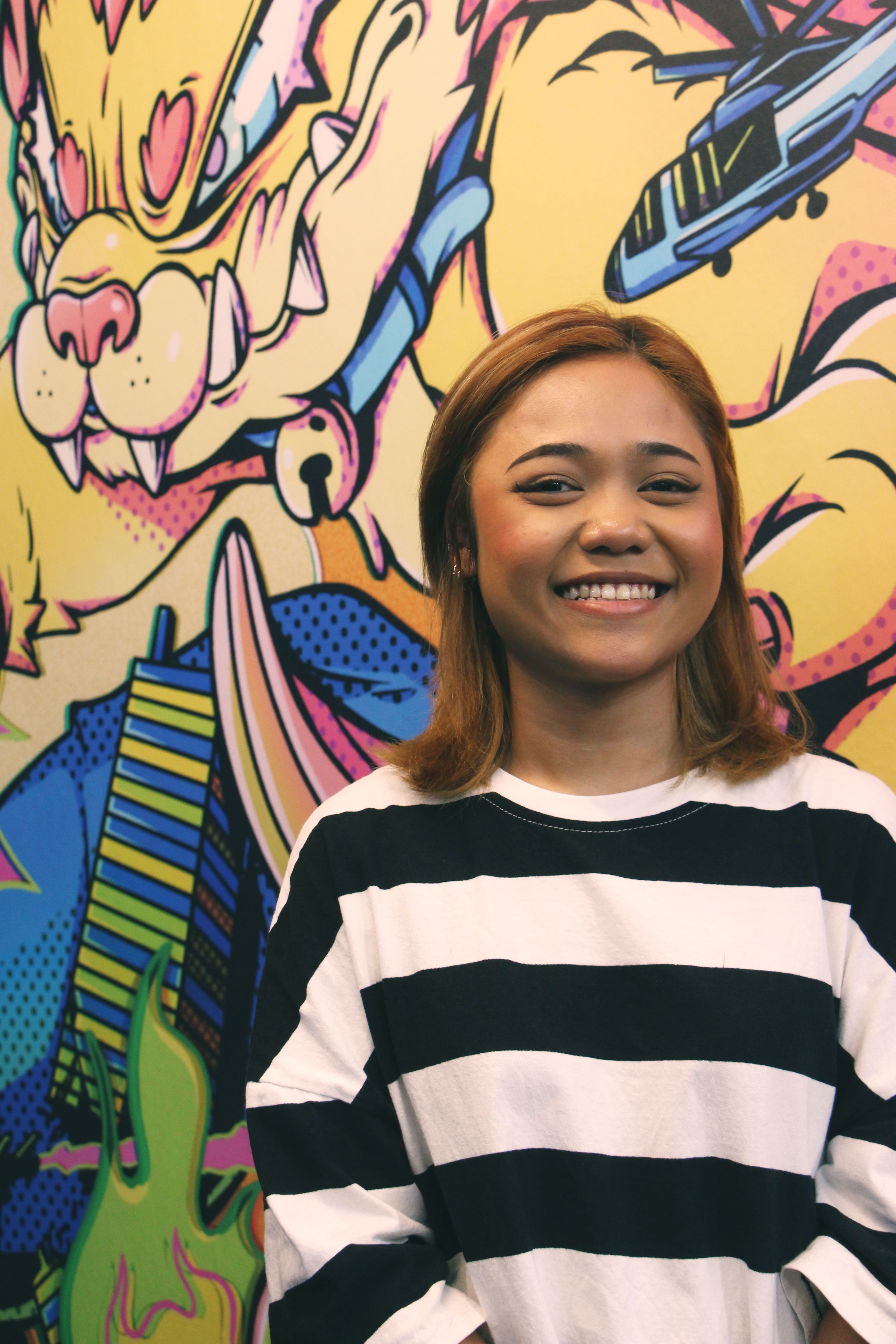 Portrait of Zah from The Good Guys Barbershop, a female barber making her strides in a traditionally male-dominated world. (Photo by Blues)