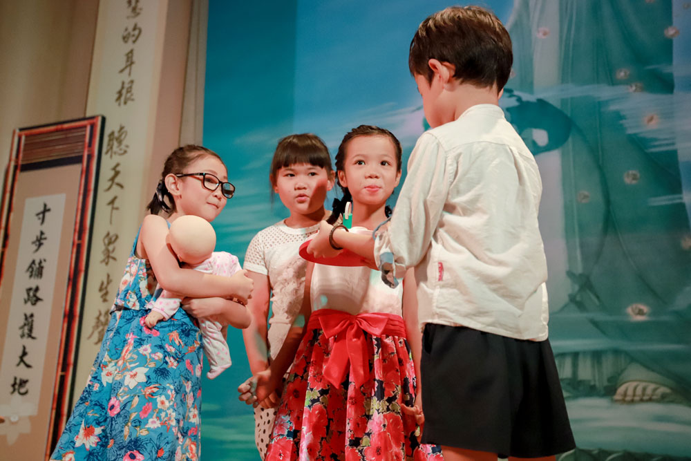 K2 students staging the scene, “Ten Kinds of Gratitude”, from the sutra adaptation of the Sutra of Profound Gratitude towards Parents. (Photo by Khor Kim Seng)